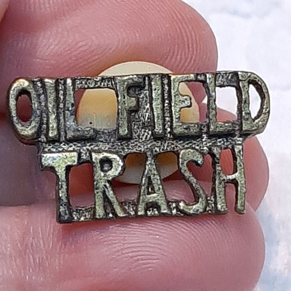 Vintage OIL FIELD TRASH metal lapel pin Gold/Brass-Tone Western oilfield
